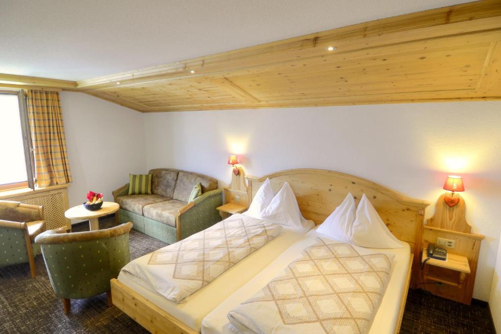 Hotel Restaurant Alpina Grindelwald Quarto foto